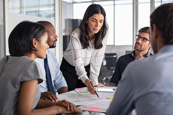 woman presenting ideas in meeting